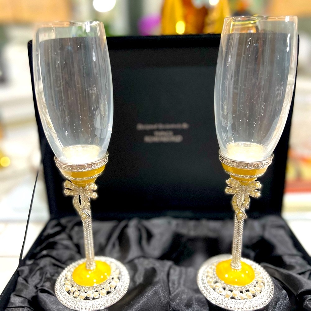 2 PC Fluted Champagne9 3/4” Tall  Silver Pearl Excellent condition.